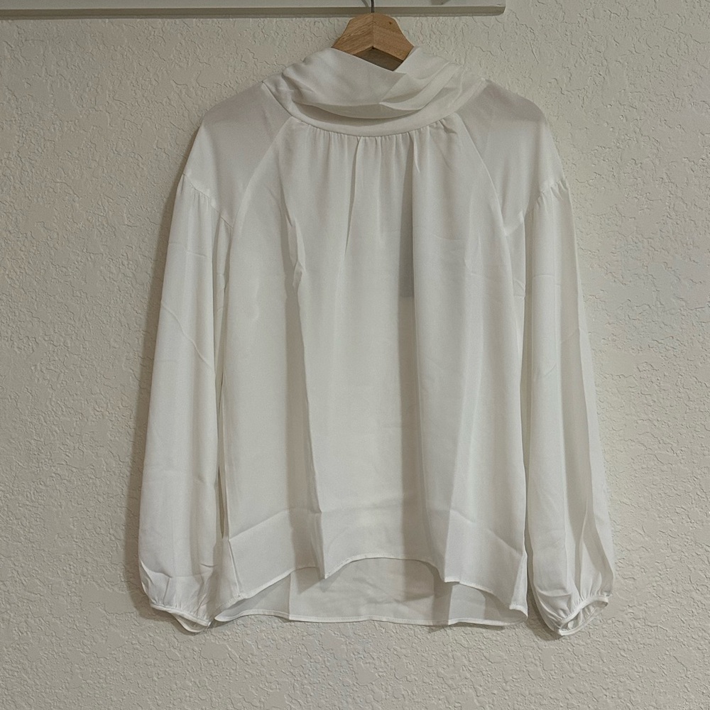 Elegant Ivory Smocked Women's Top by Krisa